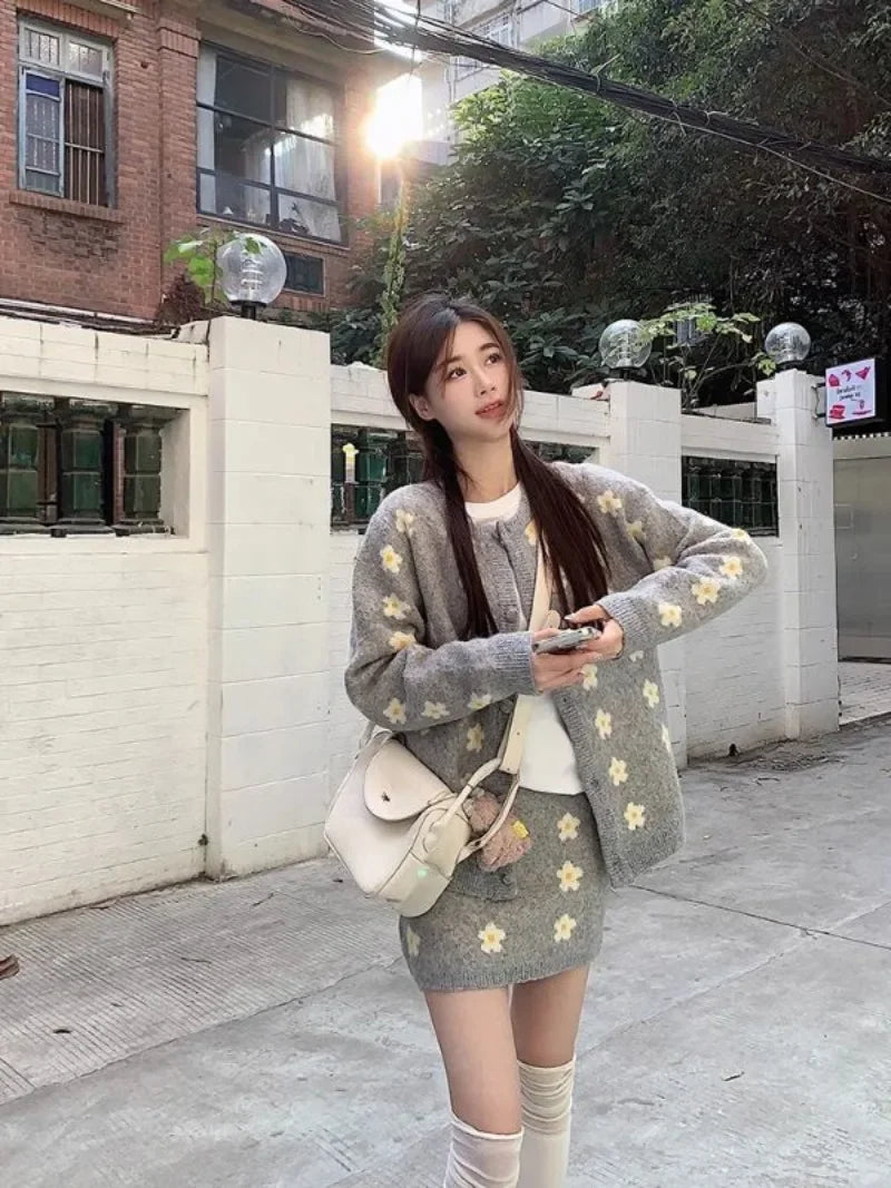 Sweet Hot Girl Knitted Suit Women's Autumn and Winter Oneck Loose Cardigan Wrap Hip Skirt Twopiece Set Fashion Female Clothes