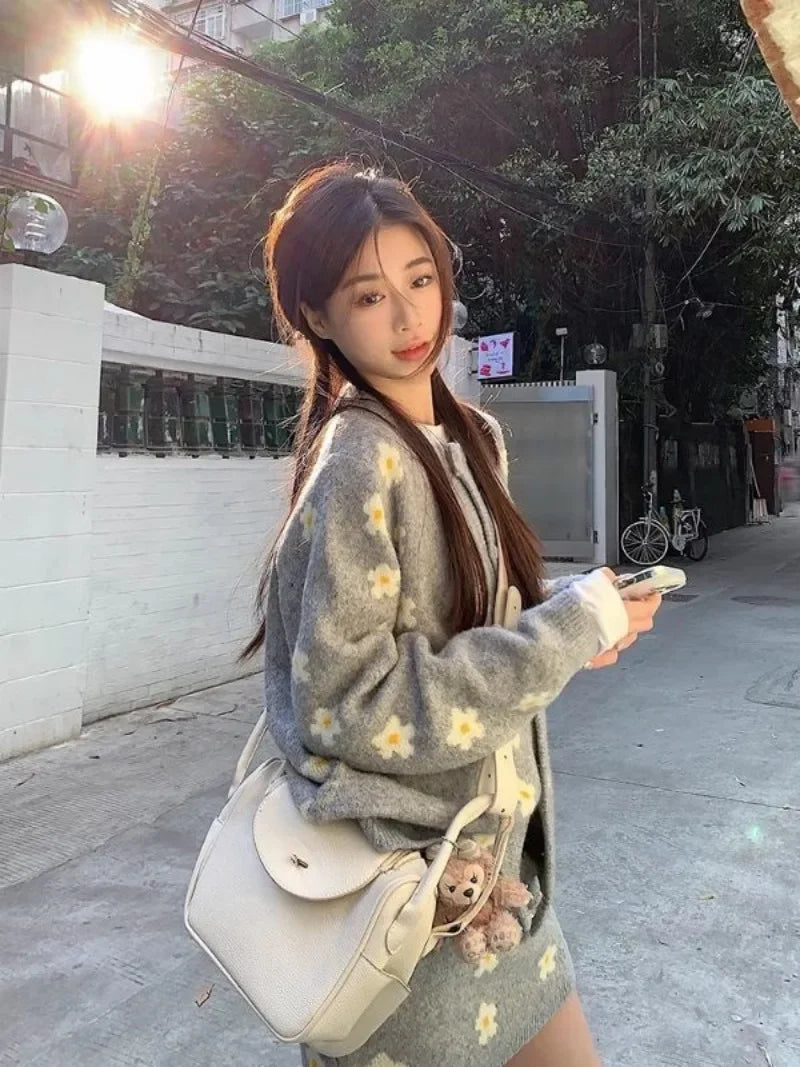 Sweet Hot Girl Knitted Suit Women's Autumn and Winter Oneck Loose Cardigan Wrap Hip Skirt Twopiece Set Fashion Female Clothes